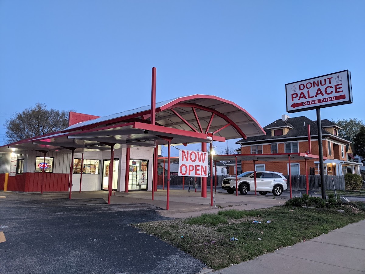 Donut Palace drive-thru storefront with the DONUT PALACE sign on North Broadway